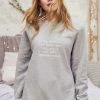 Om & Ah London - US "Full Moon" Relaxed Sweater